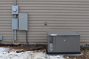 Standby generator connected to junction box feeding power to the whole house.